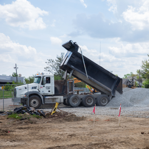 Construction on Arnold Place in development. Image shows a dump truck at work.